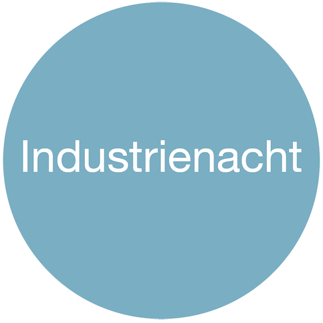 Blauer Kreis mit weissem Schriftzug «Industrienacht»
